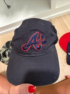 New Era Black Hat with Red and Blue Embroidered 'A' Logo